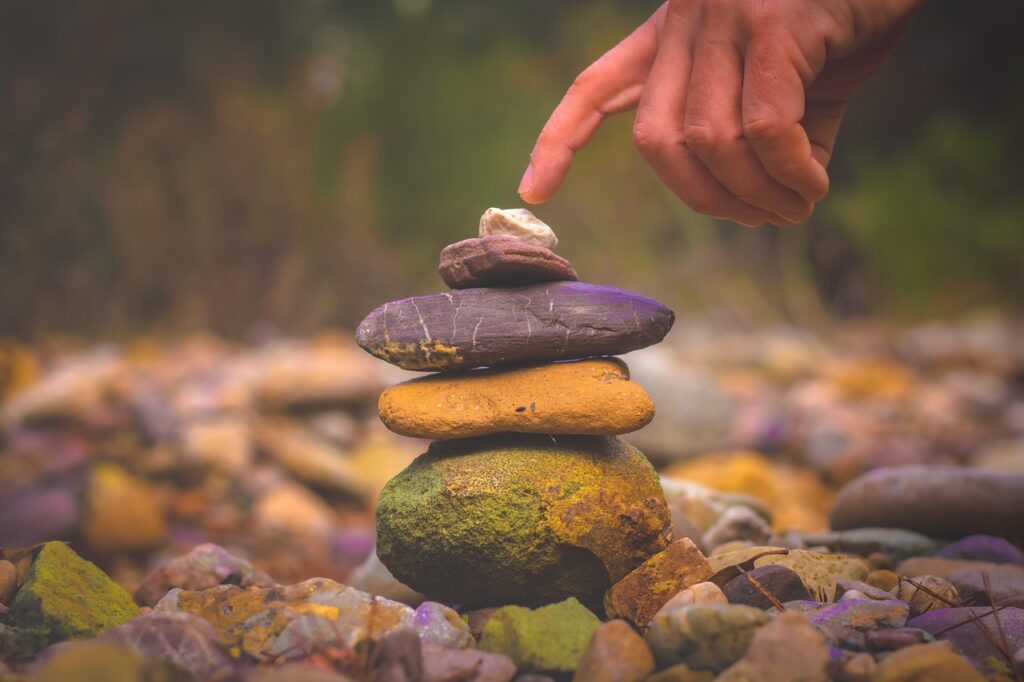 hand, touch, stones