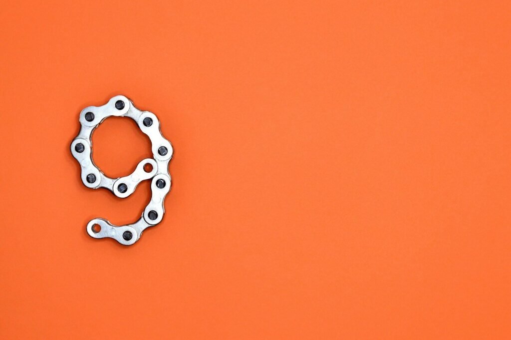The number nine is made of bike chain